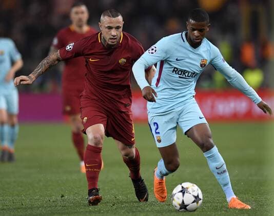 Fußball, CL, AS Rom - FC Barcelona (180411) -- ROME, April 11, 2018 -- Roma s Radja Nainggolan (L) vies with Barcelona s Nelson Semedo during a UEFA Champions League Quarter Final Second Leg soccer match between Roma and Barcelona in Rome, Italy, April 10, 2018. Roma won 3-0. ) (SP)ITALY-ROME-UEFA-CHAMPIONS LEAGUE-ROMA VS BARCELONA AlbertoxLingria 