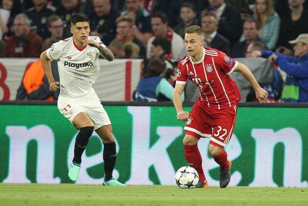 In action with Joaquin Correa 11 FC Sevilla and Joshua Kimmich 32 Bayern Munich Muenchen FC vs Sevilla FC Quarterfinals Champions League 11 04 2018 Muenchen Bayern Germany Copyright: xkolbert-press ChristianxKolbertx