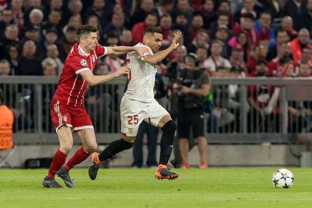 Muenchen Germany 11 04 2018 UEFA Champions League 2017 18 Season Quarter finals Second leg Bayern Munich Sevilla FC Robert Lewandowski FCB and Gabriel Mercado FCS in a duel DeFodi048