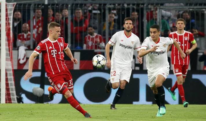 UEFA Champions League FC Bayern Munich Sevilla FC Quarter-finals Relegation Quarter Finals 2nd leg 11 04 2018 at Allianz Arena Season 2017 18 xmdx Wissam BEN YEDDER 9 Sevilla FC Joshua KIMMICH 32 FC Bayern Muenchen FC Bayern Muenchen Sevilla FC