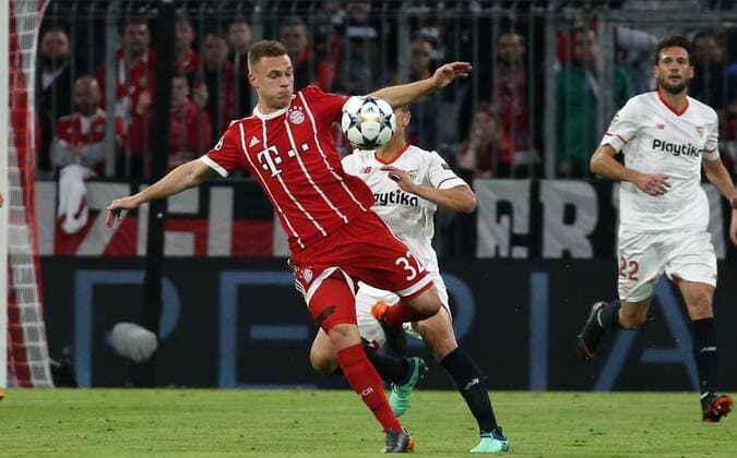 UEFA Champions League FC Bayern Munich Sevilla FC Quarter-finals Relegation Quarter Finals 2nd leg 11 04 2018 at Allianz Arena Season 2017 18 xmdx Wissam BEN YEDDER 9 Sevilla FC Joshua KIMMICH 32 FC Bayern Muenchen FC Bayern Muenchen Sevilla FC