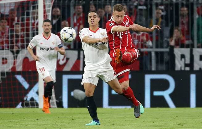 UEFA Champions League FC Bayern Munich Sevilla FC Quarter-finals Relegation Quarter Finals 2nd leg 11 04 2018 at Allianz Arena Season 2017 18 xmdx Wissam BEN YEDDER 9 Sevilla FC Joshua KIMMICH 32 FC Bayern Muenchen FC Bayern Muenchen Sevilla FC