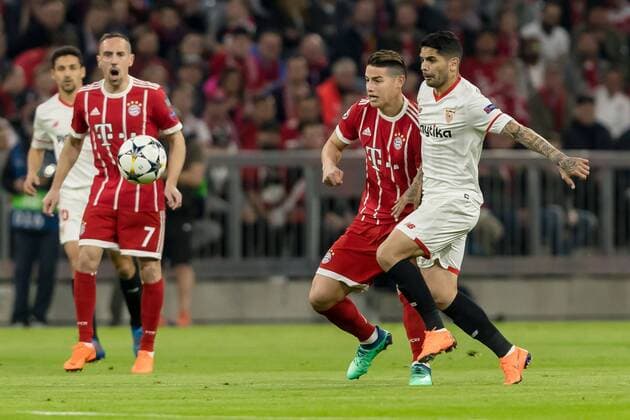 Munich Germany 11 04 2018 UEFA Champions League 2017 18 Season Quarter finals Second leg FC Bayern Muenchen Sevilla FC James Rodriguez FCB and Ever Banega FCS in a duel DeFodi048