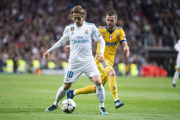 Real Madrid Luka Modric and Juventus Miralem Pjanic during Champion League match between Real Madrid and Juventus at Santiago Bernabeu Stadium in Madrid, Spain. April 11, 2018.  (20180411009)