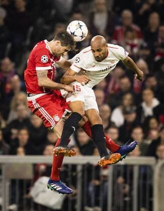 Munich 11 04 2018 Javi Martinez FCB Steven N Zonzi Sevilla FC Bayern Munich Sevilla FC