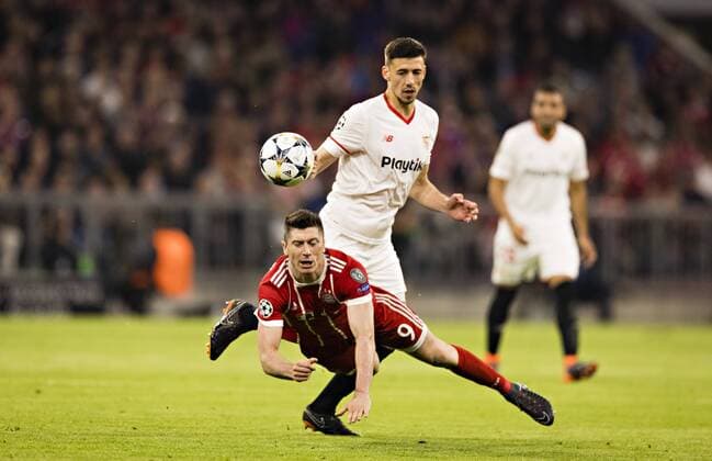 Munich 11 04 2018 Robert Lewandowski FCB Clement Lenglet Sevilla FC Bayern Munich Sevilla FC