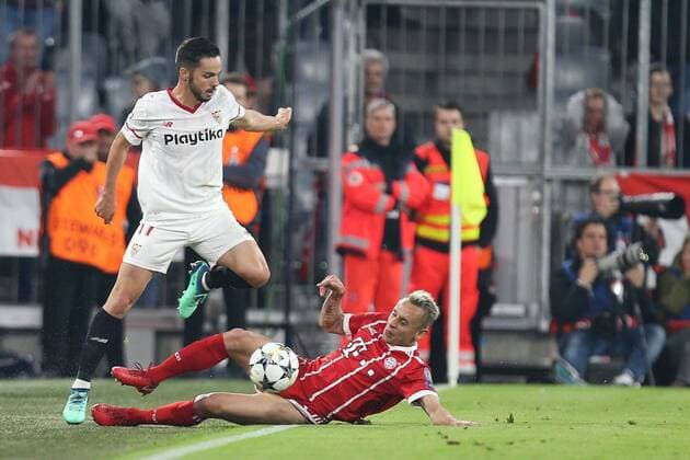 In action with Pablo Sarabia 17 FC Sevilla and Rafinha 13 FC Bayern Muenchen FC Bayern Muenchen vs Sevilla FC Quarterfinals Champions League 11 04 2018 Muenchen Bayern Germany Copyright: xkolbert-press ChristianxKolbertx