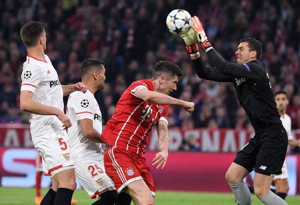 FOOTBALL CHAMPIONS LEAGUE SEASON 2017 2018 QUARTERLY FINAL RECEPTION Bayern Munich Muenchen FC Sevilla 11 04 2018 Clement Lenglet Gabriel Mercado and goalkeeper David Soria v l all FC Sevilla against Robert Lewandowski Bayern Munich Muenchen
