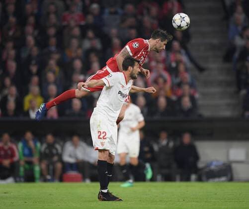 11 04 2018 Football UEFA Champions League Season 2017 2018 Quarter-finals FC Bayern Muenchen FC Sevilla Martinez Bayern Munich top against Franco Vazquez FC Sevilla Team2