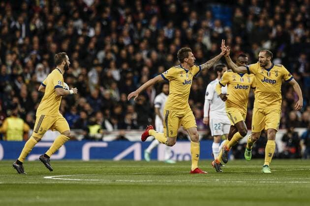 11th April 2018, Santiago Bernabeu, Madrid, Spain; UEFA Champions League football, quarter final, second leg, Real Madrid versus Juventus; Mario Mandzukic (Juventus) celebrates his goal which made it 0-1 in minute 2  ActionPlus12012176