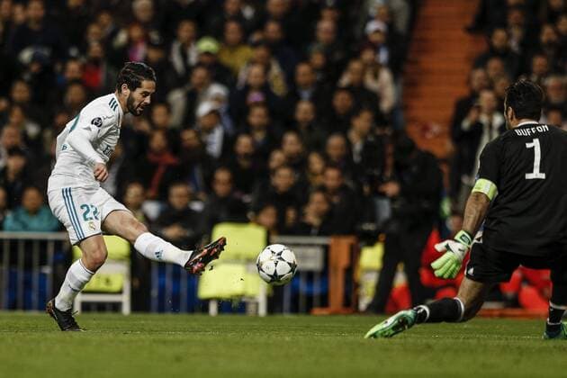 11th April 2018, Santiago Bernabeu, Madrid, Spain; UEFA Champions League football, quarter final, second leg, Real Madrid versus Juventus; Francisco Alarcon, ISCO (Real Madrid) in shooting action during the match Gianluigi Buffon (Juventus)  ActionPlus12012200