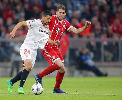 SOCCER - UEFA CL, Bayern vs Sevilla MUNICH,GERMANY,11.APR.18 - SOCCER - UEFA Champions League, quarter finals, FC Bayern Muenchen vs FC Sevilla. Image shows Nolito (Sevilla) and Javi Martinez (Bayern). GEPAxpictures xThomasxBachun
