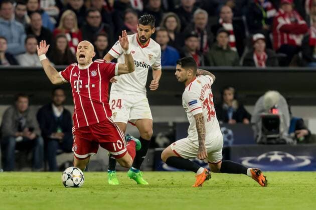 Muenchen Germany 11 04 2018 UEFA Champions League 2017 18 Season Quarter finals Second leg FC Bayern Muenchen Sevilla Sergio Escudero FC FC Ever Banega FCS and Arjen Robben FCB in action DeFodi048