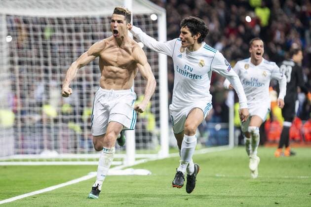 Real Madrid Cristiano Ronaldo and Jesus Vallejo celebrating a goal during Champion League match between Real Madrid and Juventus at Santiago Bernabeu Stadium in Madrid, Spain. April 11, 2018.  (20180411042)