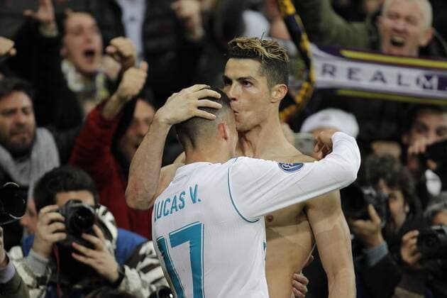 Soccer match between Real Madrid and Juventus, second leg of quarter finals of the Champions League 2017 2018, held at the Santiago Bernabeu stadium, in Madrid. (Photo: Jose Cuesta 261 Cordon Press). Cristiano Ronaldo and Lucas Vazquez celebrate after scoring.  xJosexLuisxCuestax xx