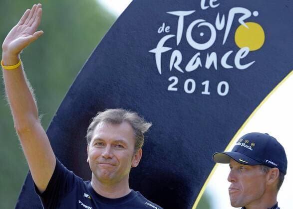 - PARIS, FRANCE: (L-R) RadioShack teammanager Johan Bruyneel and American Lance Armstrong of team RadioShack pictured on the podium, after stage 20, the last stage in the Tour, from Longjumeau to Paris (Champs-Elysees), 105 km, Sunday 25 July 2010, in Paris. Armstrong is well-known for winning the Tour de France a record seven consecutive times. BENOITxDOPPAGNE  x21413739x