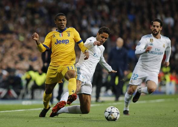 April 11, 2018 - Madrid, Spain - Douglas Costa during Champions League match between Real Madrid v Juventus, in Madrid, on April 11, 2018. Real Madrid v Juventus - UEFA Champions League Quarter Final Second Leg  - ZUMAn230 20180411_zaa_n230_750 Copyright: xLorisxRosellix