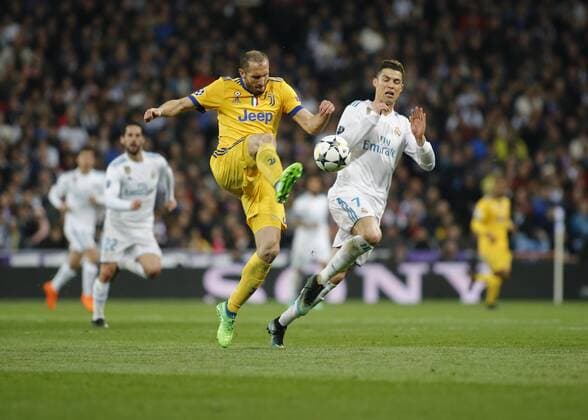 April 11, 2018 - Madrid, Spain - Giorgio Chiellini and Cristiano Ronaldo during Champions League match between Real Madrid v Juventus, in Madrid, on April 11, 2018. Real Madrid v Juventus - UEFA Champions League Quarter Final Second Leg  - ZUMAn230 20180411_zaa_n230_730 Copyright: xLorisxRosellix