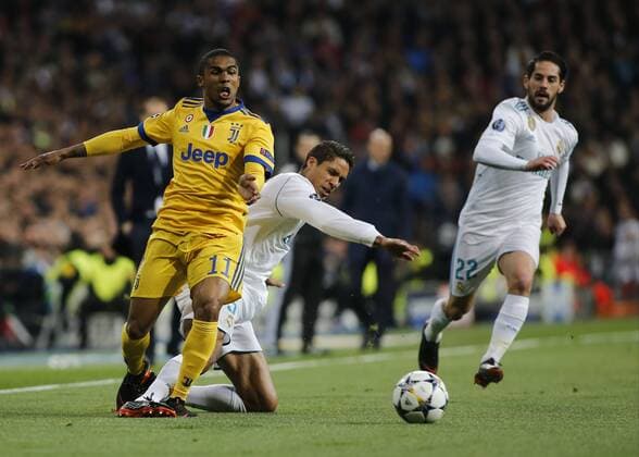 April 11, 2018 - Madrid, Spain - Douglas Costa during Champions League match between Real Madrid v Juventus, in Madrid, on April 11, 2018. Real Madrid v Juventus - UEFA Champions League Quarter Final Second Leg  - ZUMAn230 20180411_zaa_n230_766 Copyright: xLorisxRosellix