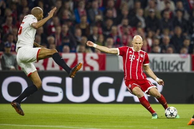 Champions League Quarter Finals FC Bayern Muenchen vs Sevilla FC Allianz Arena Munich 11 04 2018 Pictured Steven N Zonzi Gabriel mercado Ever Banega Â