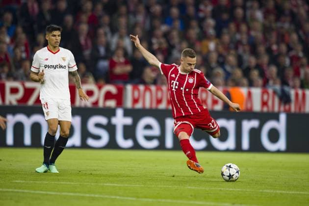 Champions League Quarter Finals FC Bayern Muenchen vs Sevilla FC Allianz Arena Munich 11 04 2018 Pictured Joaquin Correa Joshua Kimmich Â