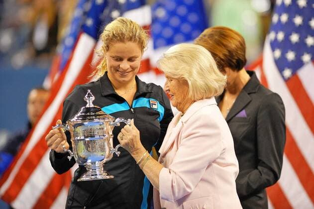 - NEW YORK, USA: Belgian tennis player Kim Clijsters celebrates with her trophy after winning her final match against Russian Vera Zvonareva, during the women s singles at the US Open Grand Slam Tennis Tournament, at Flushing Meadows, in New York City, USA, Saturday 11 September 2010. Clijsters won 6-2, 6-1. PHILIPPExBUISSIN  x22279294x