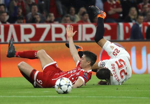 Soccer Champions League FC Bayern Sevilla FC 0 0 Robert Lewandowski was fouled by Gabriel Mercado in Munich Bayern Germany Allianz Arena