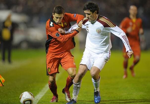 - VORONEZH, RUSSIA: (L-R) Belgium s Eden Hazard and Russia s Yuri Zhirkov fight for the ball during the friendly soccer match Russia vs Belgium, in Voronezh, Wednesday 17 November 2010. ERICxLALMAND  x23579017x