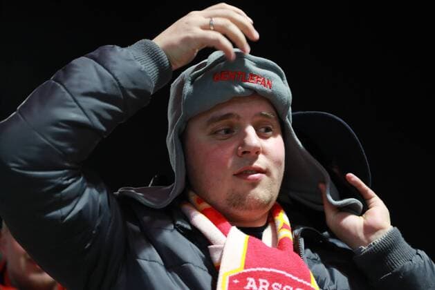 MOSCOW, RUSSIA â€“ APRIL 12, 2018: Arsenal F.C. fans given fur hats as part of the Gentlefan Russian Warm Welcome hospitality programme ahead of Leg 2 of the 2017 18 UEFA Europa League quarterfinal football match between CSKA Moscow and Arsenal F.C., at VEB Arena. Sergei Bobylev TASS  TS07BA06