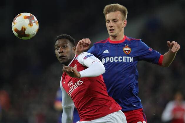 MOSCOW, RUSSIA - APRIL 12, 2018: Arsenal F.C. s Danny Welbeck (L) and CSKA Moscow s Konstantin Kuchayev in action in their 2017-2018 UEFA Europa League quarterfinal second leg football match at VEB Arena (Arena CSKA). Sergei Bobylev TASS  TS07BA34
