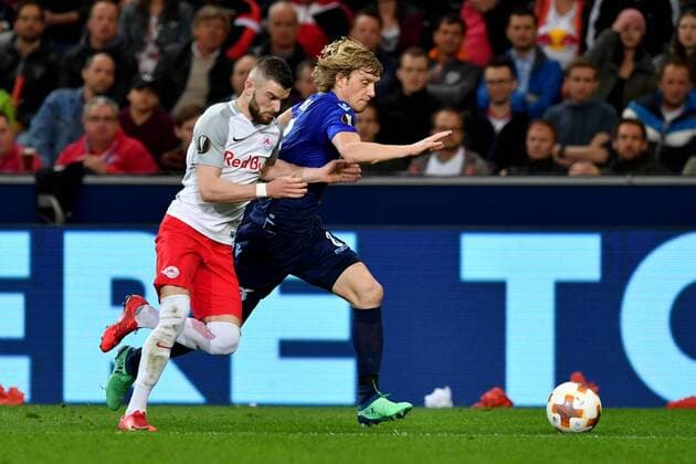 SOCCER - EL, RBS vs Lazio SALZBURG,AUSTRIA,12.APR.18 - SOCCER - UEFA Europa League, quarterfinal, Red Bull Salzburg vs SS Lazio. Image shows Valon Berisha (RBS) and Dusan Basta (Lazio). GEPAxpictures xFlorianxErtl