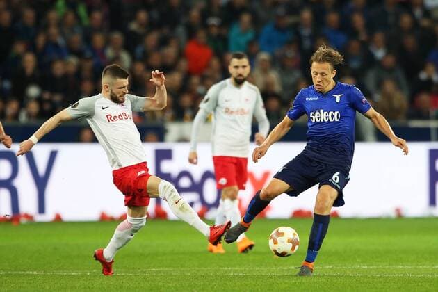 SOCCER - EL, RBS vs Lazio SALZBURG,AUSTRIA,12.APR.18 - SOCCER - UEFA Europa League, quarterfinal, Red Bull Salzburg vs SS Lazio. Image shows Valon Berisha (RBS) and Lucas Leiva Pezzini (Lazio). GEPAxpictures xMathiasxMandl