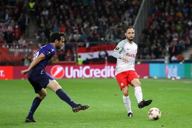 SOCCER - EL, RBS vs Lazio SALZBURG,AUSTRIA,12.APR.18 - SOCCER - UEFA Europa League, quarterfinal, Red Bull Salzburg vs SS Lazio. Image shows Marco Parolo (Lazio) and Andreas Ulmer (RBS). GEPAxpictures xChristianxWalgram
