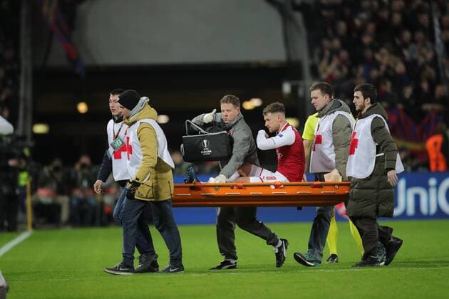 MOSCOW, RUSSIA - APRIL 12, 2018: Arsenal F.C. s Aaron Ramsey (C) injured in the 2017-2018 UEFA Europa League quarterfinal second leg football match against CSKA Moscow at VEB Arena (Arena CSKA). Sergei Bobylev TASS  TS07BA3E