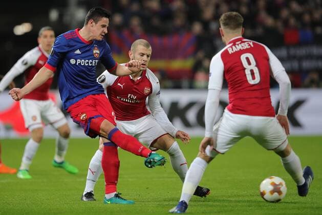 MOSCOW, RUSSIA - APRIL 12, 2018: CSKA Moscow s Kristijan Bistrovic and Arsenal F.C. s Jack Wilshere, Aaron Ramsey (L-R) in action in their 2017-2018 UEFA Europa League quarterfinal second leg football match at VEB Arena (Arena CSKA). Sergei Bobylev TASS  TS07BA40