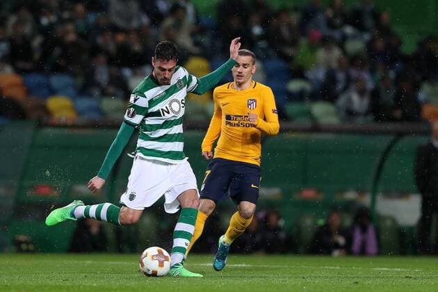 April 12, 2018 - Lisbon, Portugal - Sporting s defender Andre Pinto from Portugal (L) vies with Atletico Madrids forward Antoine Griezmann of France during the UEFA Europa League second leg football match Sporting CP vs Atletico Madrid at Alvalade stadium in Lisbon, on April 12, 2018. Sporting v Atletico Madrid - UEFA Europa League Quarter Final Leg Two  - ZUMAn230 20180412_zaa_n230_910 Copyright: xPedroxFiuzax