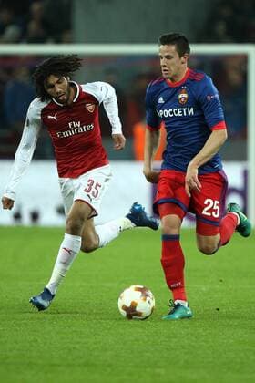MOSCOW, RUSSIA - APRIL 12, 2018: Arsenal F.C. s Mohamed Elneny (L) and CSKA Moscow s Kristijan Bistrovic fight for the ball in their 2017-2018 UEFA Europa League quarterfinal second leg football match at VEB Arena (Arena CSKA). Mikhail Tereshchenko TASS  TS07BA46