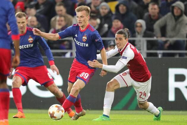 MOSCOW, RUSSIA - APRIL 12, 2018: CSKA Moscow s Alexei Berezutsky, Konstantin Kuchayev and Arsenal F.C. s Hector Bellerin (L-R) in their 2017-2018 UEFA Europa League quarterfinal second leg football match at VEB Arena (Arena CSKA). The game ended in a 2-2 draw. Sergei Bobylev TASS  TS07BA52