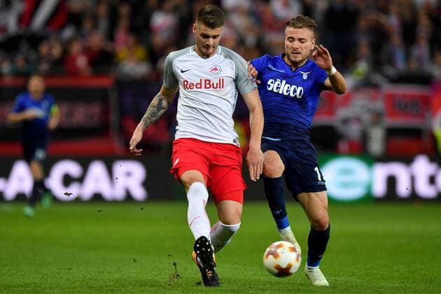 SOCCER - EL, RBS vs Lazio SALZBURG,AUSTRIA,12.APR.18 - SOCCER - UEFA Europa League, quarterfinal, Red Bull Salzburg vs SS Lazio. Image shows Duje Caleta-Car (RBS) and Ciro Immobile (Lazio). GEPAxpictures xFlorianxErtl