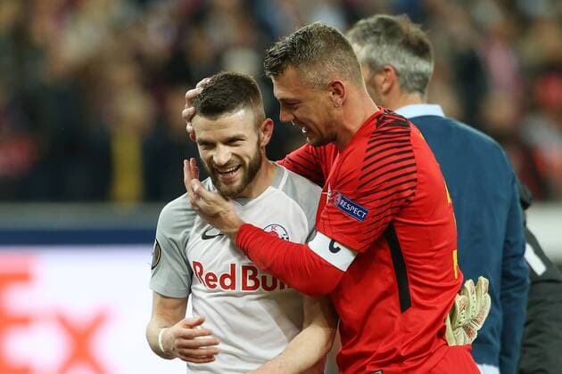 SOCCER - EL, RBS vs Lazio SALZBURG,AUSTRIA,12.APR.18 - SOCCER - UEFA Europa League, quarterfinal, Red Bull Salzburg vs SS Lazio. Image shows Valon Berisha and Alexander Walke (RBS). GEPAxpictures xMathiasxMandl