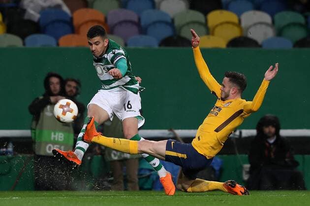 April 12, 2018 - Lisbon, Portugal - Sporting s midfielder Rodrigo Battaglia from Argentina (L) vies with Atletico Madrids midfielder Saul Niguez of Spain (R ) during the UEFA Europa League second leg football match Sporting CP vs Atletico Madrid at Alvalade stadium in Lisbon, on April 12, 2018. Sporting v Atletico Madrid - UEFA Europa League Quarter Final Leg Two  - ZUMAn230 20180412_zaa_n230_993 Copyright: xPedroxFiuzax