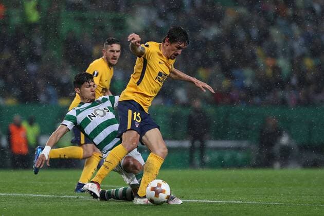 April 12, 2018 - Lisbon, Portugal - Sporting s forward Fredy Montero from Colombia (C ) fights for the ball with Atletico Madrids defender Stefan Savic of Montenegro (R ) during the UEFA Europa League second leg football match Sporting CP vs Atletico Madrid at Alvalade stadium in Lisbon, on April 12, 2018. Sporting v Atletico Madrid - UEFA Europa League Quarter Final Leg Two  - ZUMAn230 20180412_zaa_n230_996 Copyright: xPedroxFiuzax
