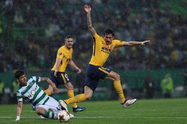 April 12, 2018 - Lisbon, Portugal - Sporting s forward Fredy Montero from Colombia (L ) fights for the ball with Atletico Madrids defender Stefan Savic of Montenegro (R ) during the UEFA Europa League second leg football match Sporting CP vs Atletico Madrid at Alvalade stadium in Lisbon, on April 12, 2018. Sporting v Atletico Madrid - UEFA Europa League Quarter Final Leg Two  - ZUMAn230 20180412_zaa_n230_995 Copyright: xPedroxFiuzax