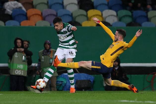 April 12, 2018 - Lisbon, Portugal - Sporting s midfielder Rodrigo Battaglia from Argentina (L) vies with Atletico MadridÂ«s midfielder Saul Niguez of Spain (R ) during the UEFA Europa League second leg football match Sporting CP vs Atletico Madrid at Alvalade stadium in Lisbon, on April 12, 2018. UEFA Europa League second leg football match Sporting CP vs Atletico Madrid - ZUMAf123 20180412_zap_f123_010 Copyright: xPedroxFiuzax