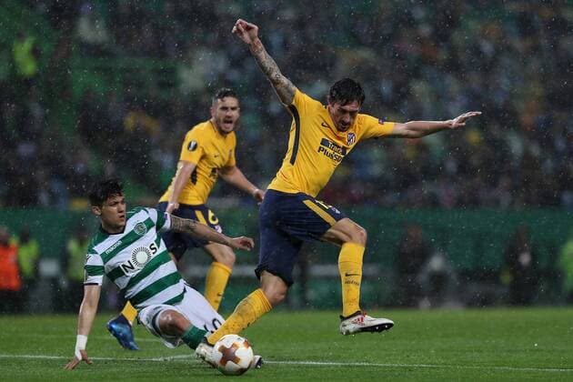 April 12, 2018 - Lisbon, Portugal - Sporting s forward Fredy Montero from Colombia (L ) fights for the ball with Atletico MadridÂ«s defender Stefan Savic of Montenegro (R ) during the UEFA Europa League second leg football match Sporting CP vs Atletico Madrid at Alvalade stadium in Lisbon, on April 12, 2018. UEFA Europa League second leg football match Sporting CP vs Atletico Madrid - ZUMAf123 20180412_zap_f123_011 Copyright: xPedroxFiuzax