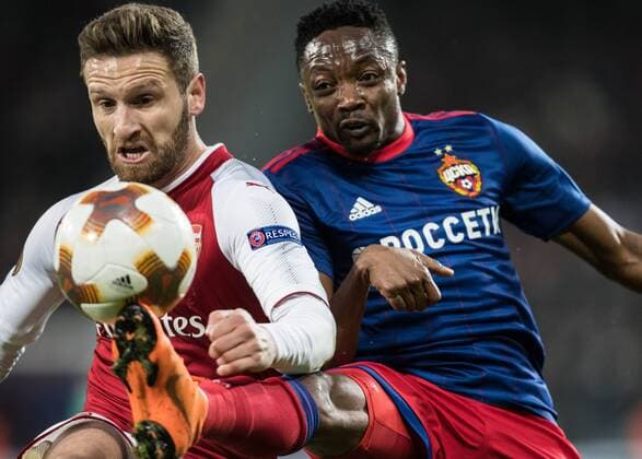 (180413) -- MOSCOW, April 13, 2018 -- Shkodran Mustafi (L) of Arsenal vies with Ahmed Musa of CSKA Moscow during the UEFA Europa League quarterfinal second leg soccer match between CSKA Moscow and Arsenal in Moscow, Russia, April 12, 2018. The match ended 2-2. Arsenal advanced to the semifinal with 6-3 on aggregate. ) (SP)RUSSIA-MOSCOW-SOCCER-UEFA EUROPA LEAGUE-QUARTERFINAL-CSKA VS ARSENAL WuxZhuang 