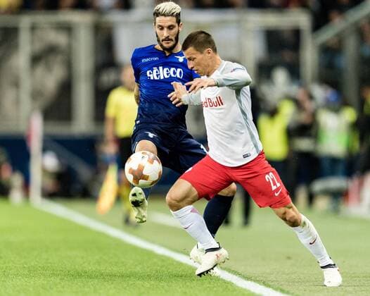 12 04 2018 Red Bull Arena Salzburg UEFA Champions League Final FC Barcelona vs SS Lazio Roma Quarter-Finals Back in the box-up video Luis Alberto SS Lazio Roma Stefan Lainer FC Salzburg during the Europa League quarter-final match between FC Salzburg and SS Lazio Roma at the Red Bull Arena in Salzburg Austria on 2018 04 12 Salzburg  EX_ADE