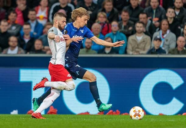 12 04 2018 Red Bull Arena Salzburg UEFA Champions League El Paso vs SS Lazio Roma Quarterfinal u003cbr u003e u003cbr u003e u003cbr u003e Valon Berisha FC Salzburg Dusan Basta SS Lazio Roma during the UEFA Europa League Foursquare match between FC Salzburg and SS Lazio Roma at the Red Bull Arena in Salzburg Austria on 2018 04 12 Salzburg  EX_FEI