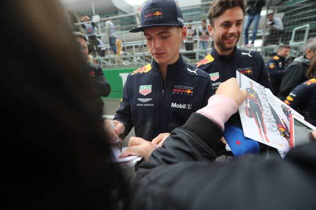 Dutch F1 driver Max Verstappen of Red Bull Racing autographs for fans at the Shanghai International Circuit before the 2018 Formula 1 Chinese Grand Prix in Shanghai, China, 12 April 2018. F1 drivers wow fans with signatures and selfies in Shanghai  20180412_14020