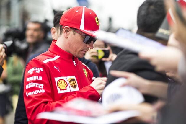 Finnish F1 driver Kimi Raikkonen of Ferrari signs autographs for fans at the Shanghai International Circuit before the 2018 Formula 1 Chinese Grand Prix in Shanghai, China, 12 April 2018. F1 drivers wow fans with signatures and selfies in Shanghai  20180412_61325